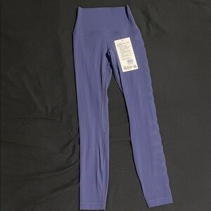 Dark blue 25in align leggings with lululemon spelling down the leg